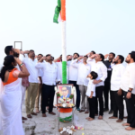 Teenmar Mallanna hoisting national flag