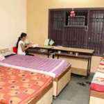 “Government hostel building for girl students symbolizing education support and women empowerment in India.”